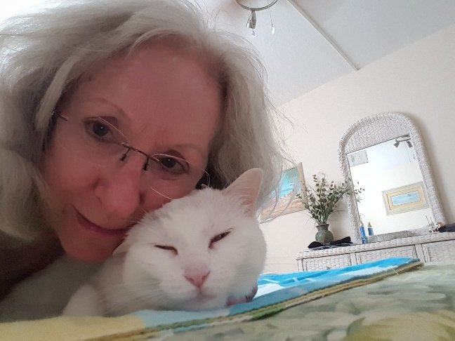 jnhobson17's tweet photo. Here's a picture taken a few years ago of me hugging Karma. She's not into being held or hugged.πΈ #nationalhugyourcatday #hugyourcatday https://t.co/wdIvwH83LS