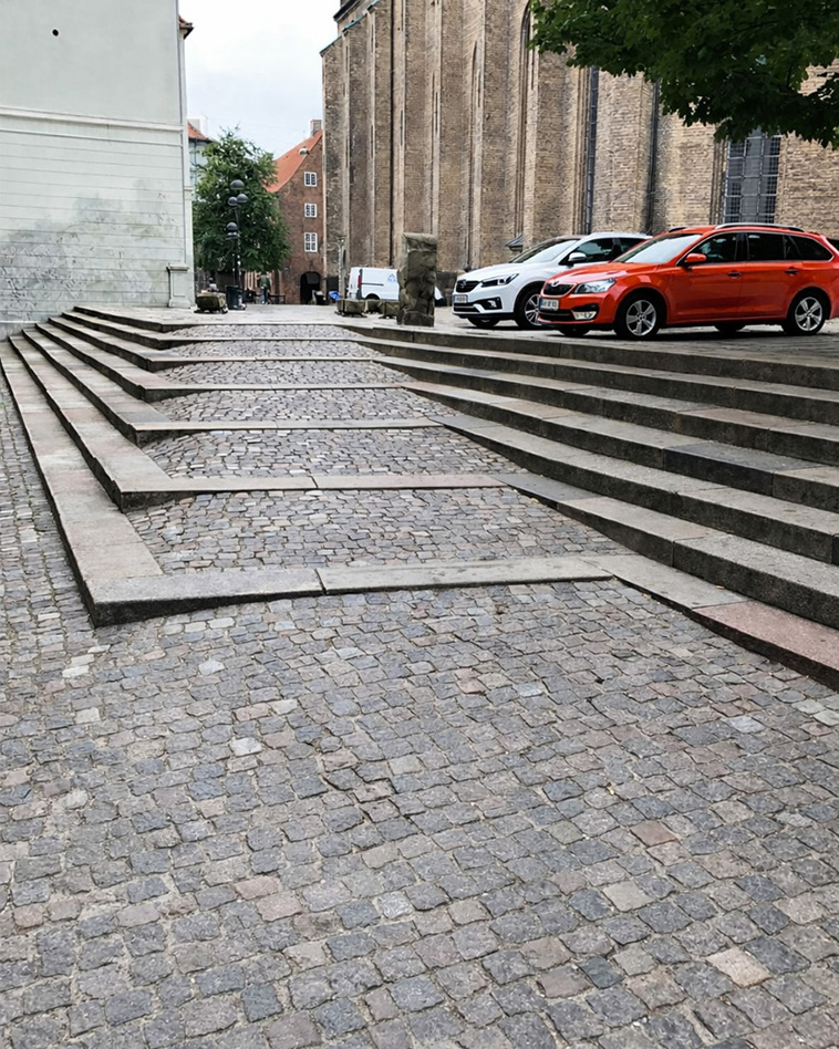 archpng's tweet photo. A quiet detail from Copenhagen: steps and a ramp folded into the same public space. https://t.co/YanTqkjLzV