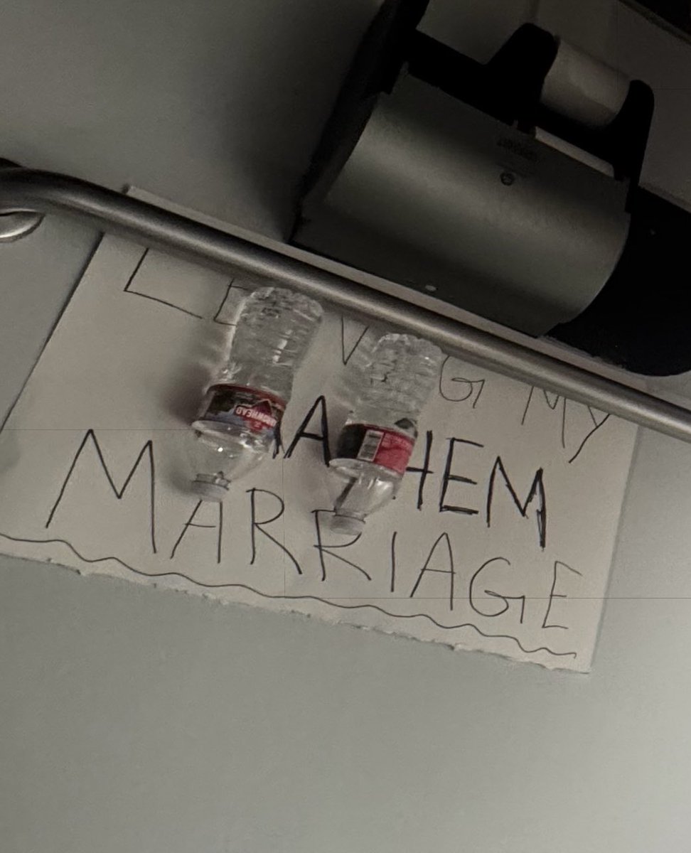 jomaticaaa's tweet photo. now why am I just now realizing someone left their mayhem themed divorce announcement poster in this bathroom stall at the LA show https://t.co/fovHTN6YJT