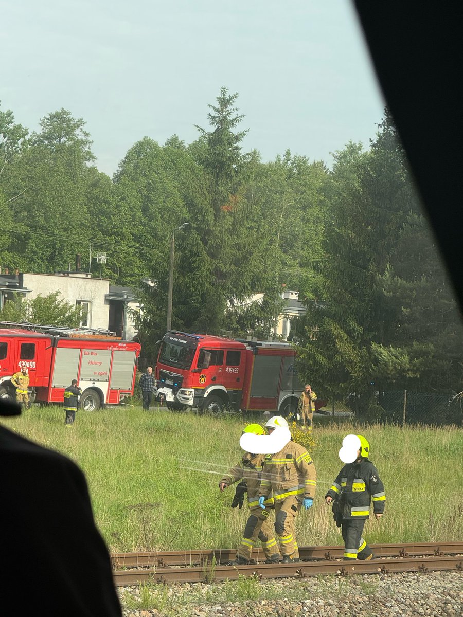 mnowak_eth's tweet photo. My train headed for Krakow broke in the middle of nowhere (where else lol) and we are waiting for another train to take us there. 

So 3 fire brigades arrives „to assist the passengers with changing the train”

Stay tuned https://t.co/4zM1VUQ34F