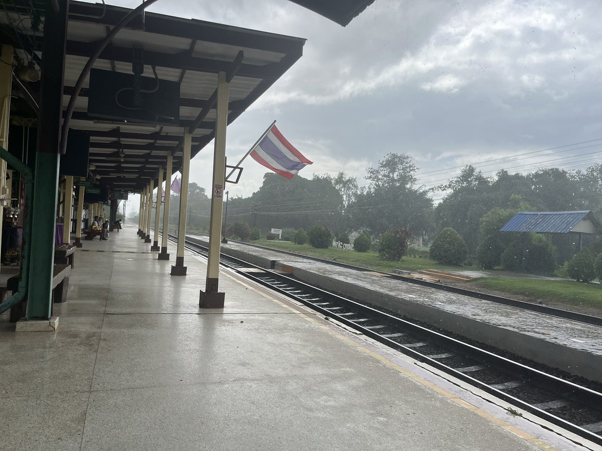 RobRovingReport's tweet photo. Waiting at Kanthararom station in the rain. Proper football weather.

Heading to watch England play in a World Cup semifinal in Ubon Ratchathani after riverside beers and snacks. https://t.co/StkU88jzZM