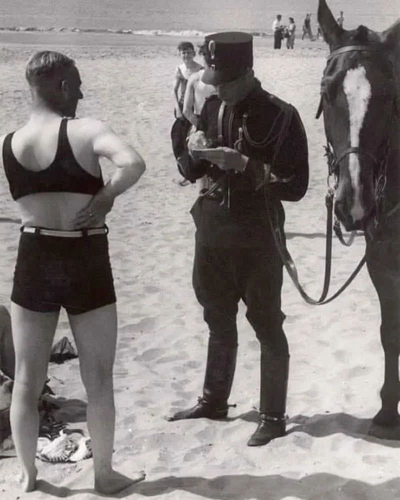 fasc1nate's tweet photo. A man on the beach is fined for indecent clothing, Heemskerk, Netherlands, 1931.

More rare photos: https://t.co/W7jIvOHun5 https://t.co/3VMFUQ5NTd