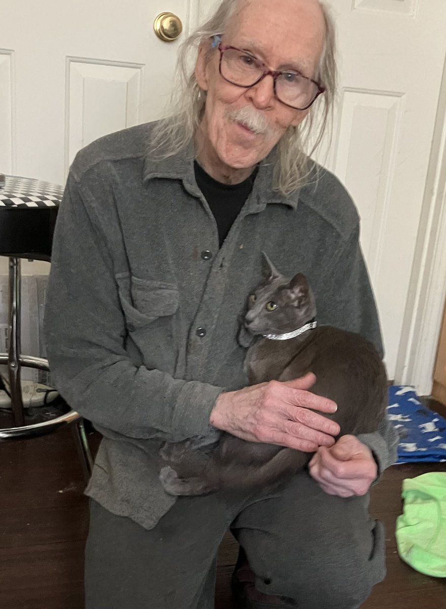 suzstephens's tweet photo. Dave knelt down to talk to Dobby this afternoon. Then, in possibly the sweetest cat move I’ve ever seen, Dobby reached out a paw to tap Dave on the leg asking permission to sit in Dave’s lap. 

Dammit, Dave has stolen another of my cats! https://t.co/K7qs0lldzs