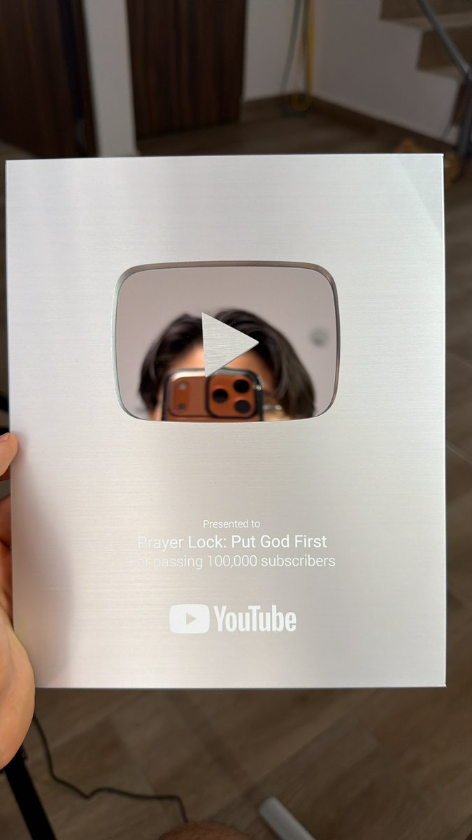Photo of our automated channel's YouTube Play Button