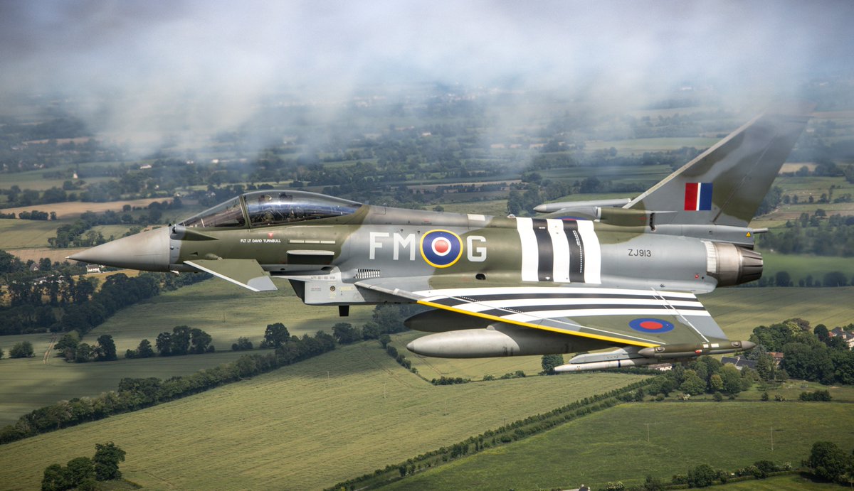 conradical247's tweet photo. @Captain_Fubar I remember one of the D-Day celebrations a while back A couple of RAF Eurofighters and RCAF F-18's got painted up like spitfires with green camo and Invasion stripes. https://t.co/bDx96YY6H4