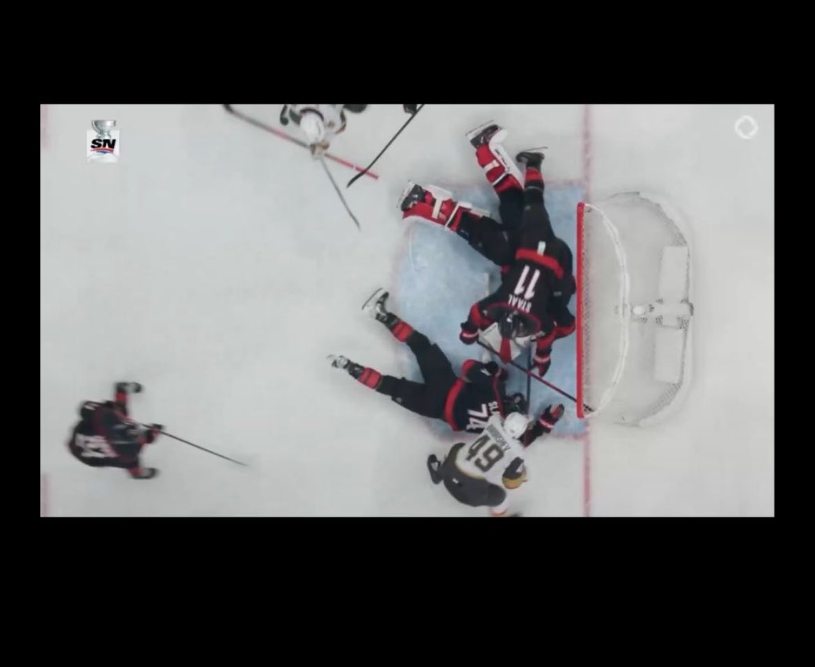 Jack_dec2's tweet photo. @CamJohnsie @RedstateDem86 @espn ???? he’s laying on top of it and puck isn’t in https://t.co/iPyEte3K2u