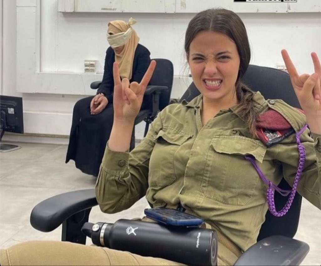 Do you remember this savage Israeli soldier whos taking a selfie in front of an old blindfolded Palestinian hostage?