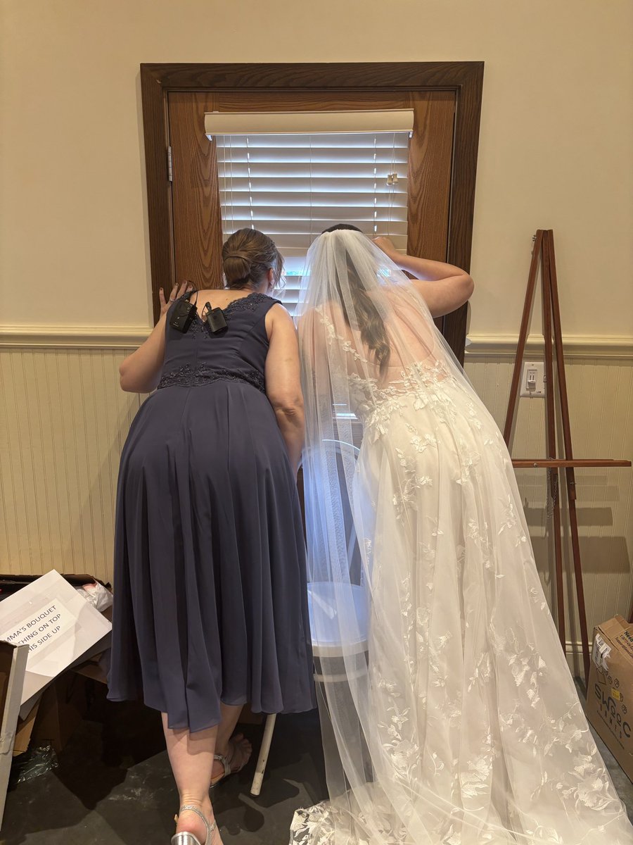 swifferwins's tweet photo. this is so random but i was looking in my camera roll for a diff pic and found this pic my sister took of my mom and i watching guests arrive at my wedding and it cracks me up 😂 two nosy bitches!! https://t.co/ExFZgxFra9
