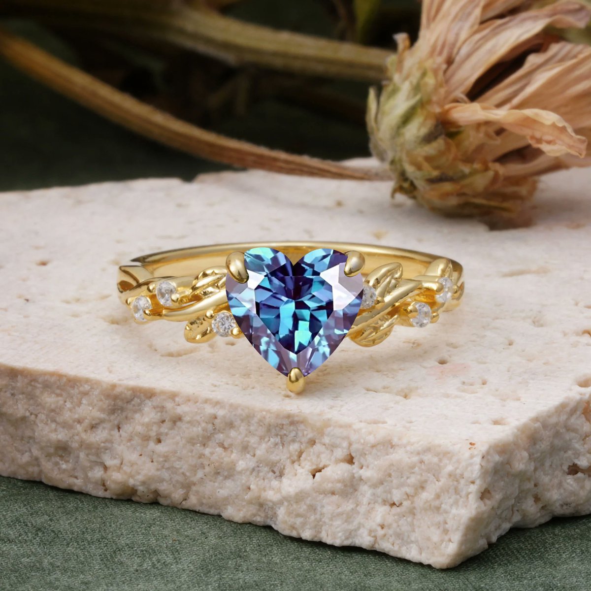 Romalarjewelry's tweet photo. Color-shifting romance. 🌿✨ This leaf-accented Heart Alexandrite is pure fairytale magic. The ultimate "yes". 💜💚 #Alexandrite #HeartRing #Fairycore #EngagementRing #ROMALAR https://t.co/9hIVXNnHAj