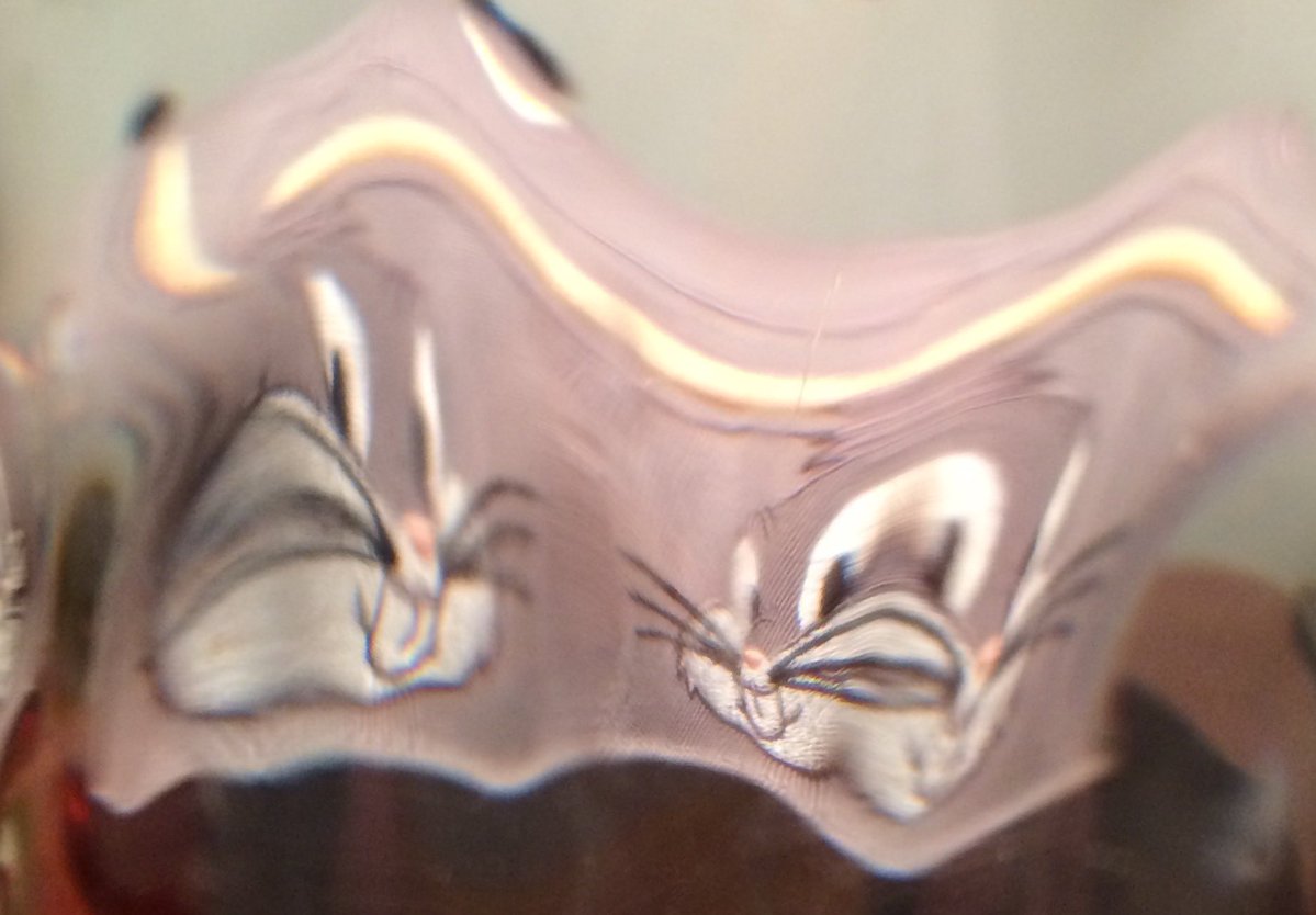 stephenacton7's tweet photo. @shagbark_hick Vodka, ice and a splash of seltzer for 10 years. Silly Wabit, a drinks a drunk just less witnesses drinking from a handle. 
The picture is of a hat through one of my many tall and icy 🥶 drinks. https://t.co/V1sW68b3zG