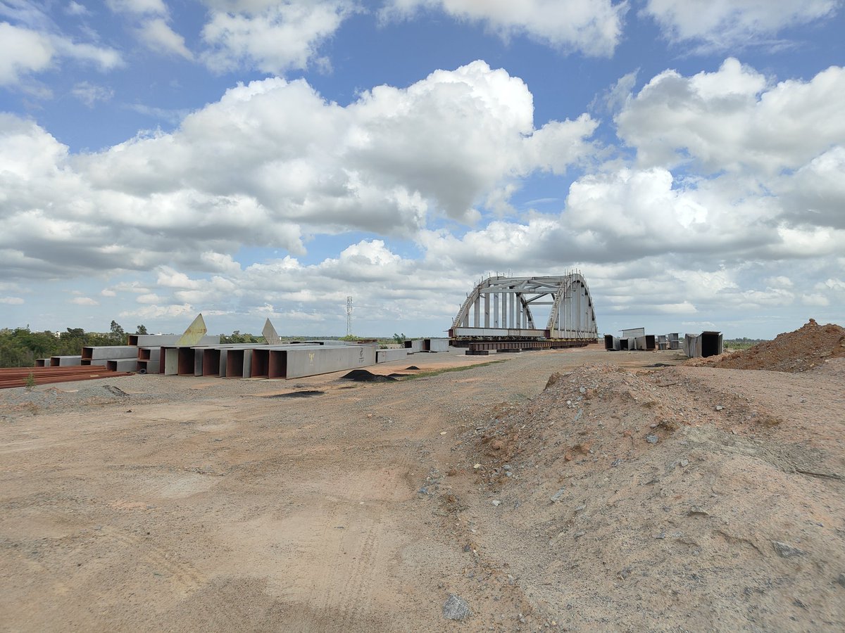 AgantukBlr's tweet photo. For what its worth, there indeed looks to be the beginning of preparation for the rhs bridge.
New girders are lined up on the ground as seen in the pic. Hope the assembly starts soon.
@ChristinMP_
#MalurRoB #STRR https://t.co/C7HiDlazke