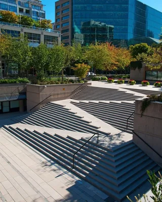 Rainmaker1973's tweet photo. Canadian Architect Cornelia Oberlanders designed the world's first "Stramp". Stairs with a ramp incorporated for those with accessibility needs. 

The Stramp allows for companions to use the ramp or steps and not break connection with one another. https://t.co/nKE6C1fQTy