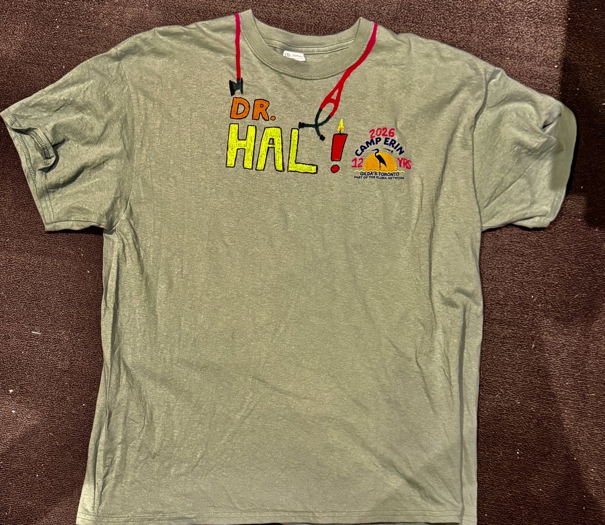 BermanPCMD's tweet photo. And we’re off!

#CampErinToronto 2026 kicks off today

This grief camp will help over 100 children who have lost a caregiver or sibling

And here is this year’s #DrHal t-shirt!

Click below to find out more about Camp Erin and see my shirts over the years

https://t.co/yf6zVrwRd0 https://t.co/xkU9qfnXkM