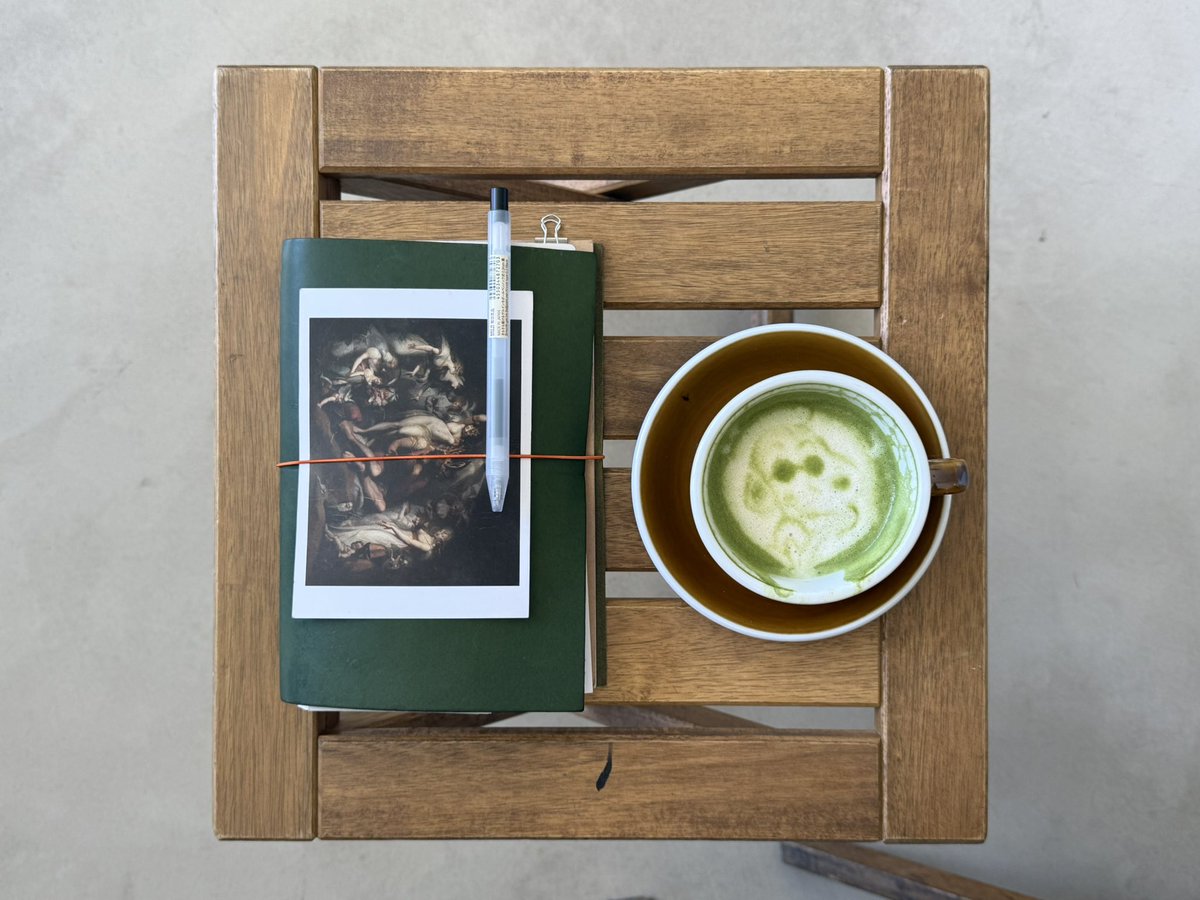 mothintoflames's tweet photo. morning pages and a snoopy matcha latte https://t.co/l9V1vTotZg