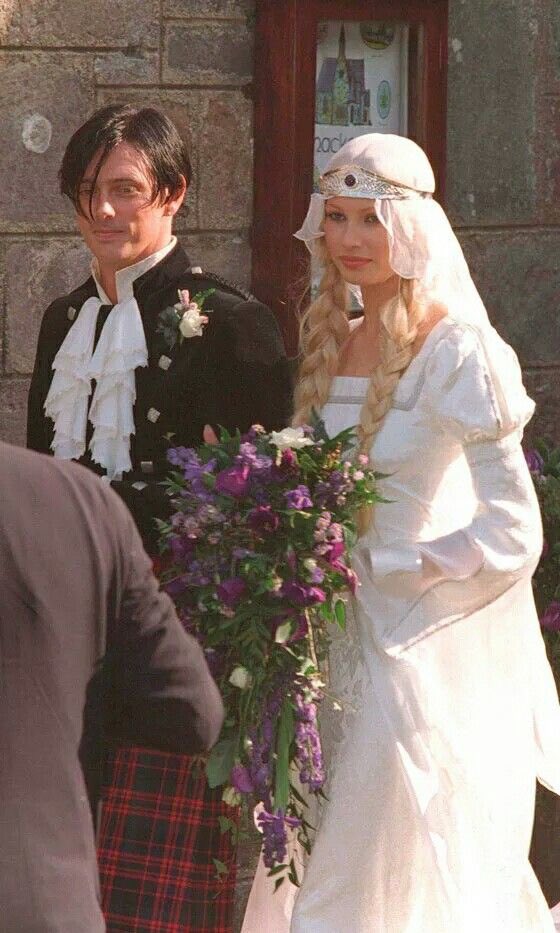 BluebellRaven's tweet photo. 1997 Scottish wedding of supermodel Kirsty Hume and actor Donovan Leitch Jr. The ceremony embraced a medieval Celtic theme. Hume wore a custom ivory gown with a jeweled headpiece and long blonde braids. Leitch wore a traditional kilt and a ruffled jabot shirt. https://t.co/9NkDXIYEpY