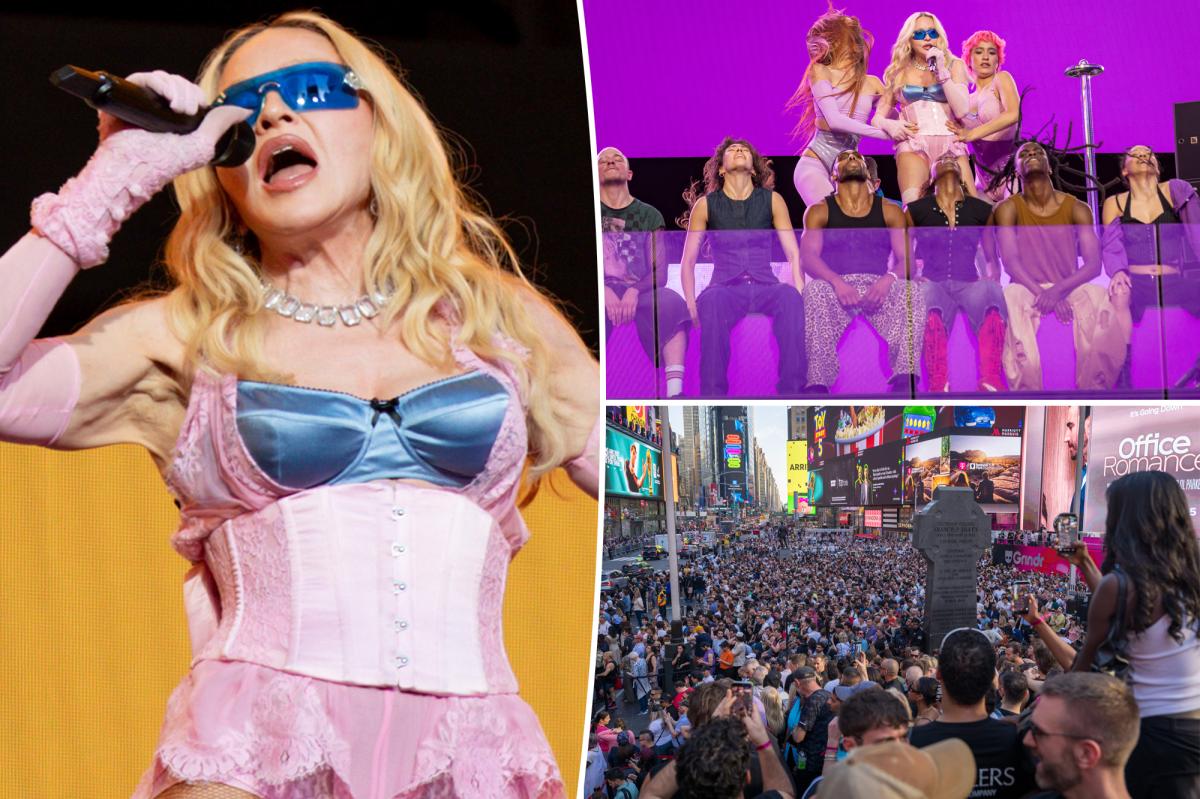 nypost's tweet photo. Madonna, 67, stops traffic in lace lingerie at surprise NYC Times Square concert https://t.co/ep2HpBntmQ https://t.co/SYgSi3I1Dm