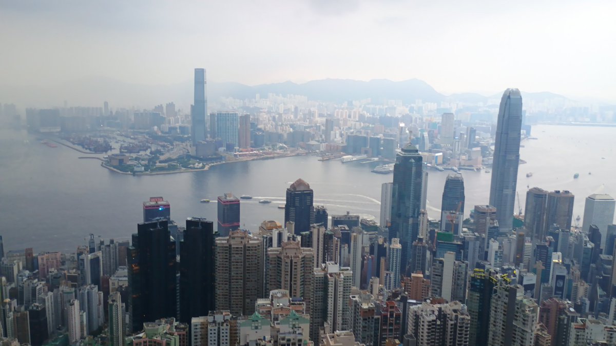 TeusIsNeverLate's tweet photo. Before, during and after the storm in Hong Kong today, with a bonus lightning strike. ⚡

Love it when you can see the cold front with rain coming in. https://t.co/cfDSK1tMuU