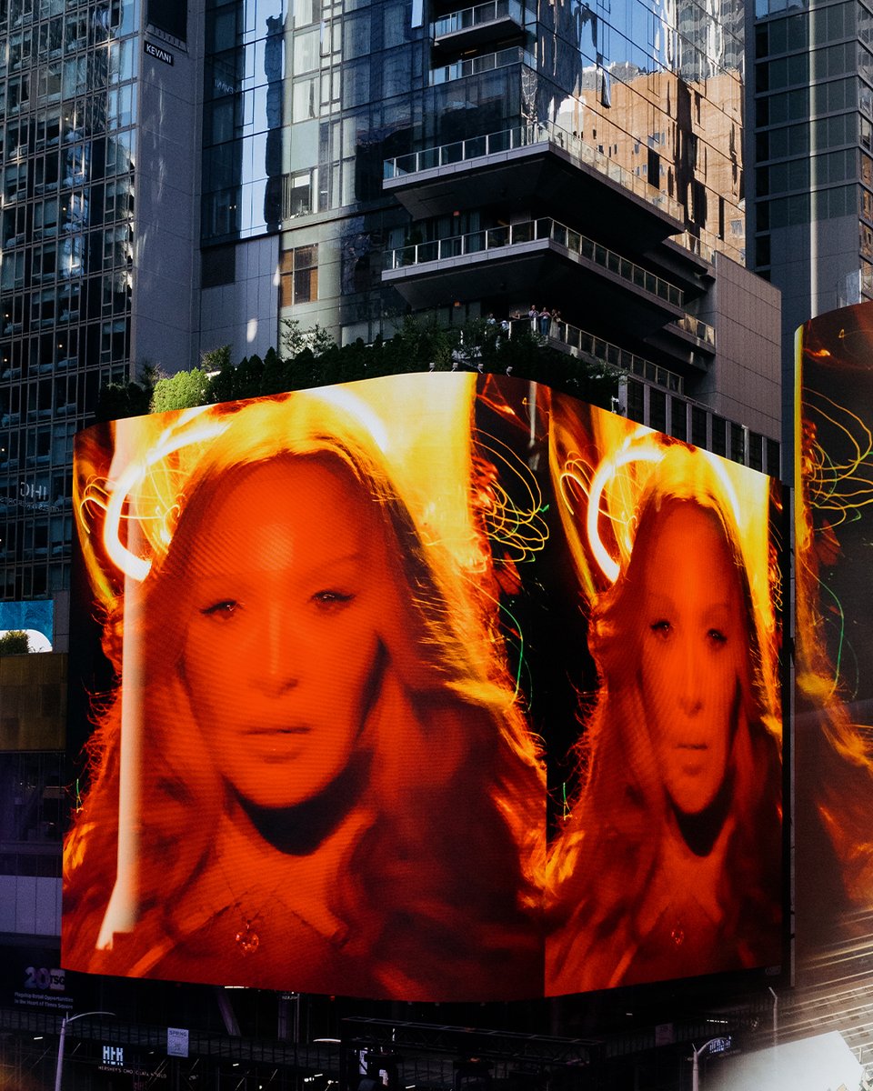 dolcegabbana's tweet photo. In front of a Times Square transformed into a dancefloor, @Madonna, in a custom #DolceGabbana look, delivered a standout performance streamed live on @Grindr, offering a first preview of her new album Confessions II.  

Styling: Rita Melssen
Photography: Alex Antonioni and Ricardo Gomes

#DGFattoAMano