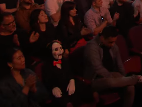 CelliePop's tweet photo. why the fuck is jigsaw in the Summer game fest audience https://t.co/JfL9kuVxkx