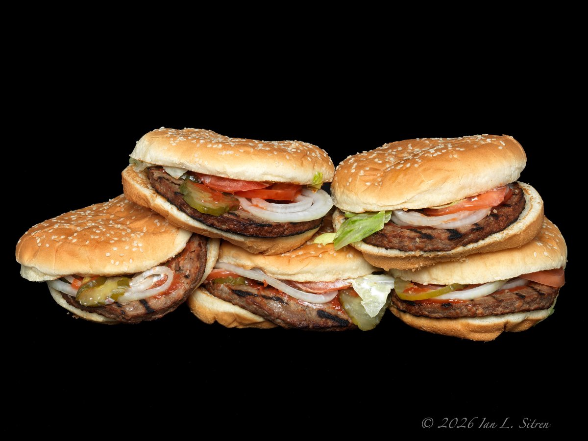 SecondFocus's tweet photo. National Veggie Burger Day and the Impossible Whopper

There was a time when the idea of a burger chain selling a plant-based Whopper would have sounded unlikely.

Burger King built its reputation on flame-grilled beef burgers. The Whopper has been the company's signature sandwich since the 1950s and remains one of the most recognizable items in fast food.

Then came the Impossible Whopper.

Introduced nationally in 2019, the sandwich looked like a Whopper, was built like a Whopper, and was sold right alongside the traditional version. The difference was the patty, which was made from plant-based ingredients rather than beef.

Today's photograph features a stack of Burger King Impossible Whoppers for my FOOD FROM BAG TO BACKGROUND series.

One of the reasons the Impossible Whopper attracted so much attention was that it wasn't aimed exclusively at vegetarians. Burger King positioned it as an alternative that could appeal to anyone curious about plant-based burgers while still delivering a familiar fast-food experience.

Whether someone chooses it for environmental reasons, dietary preferences, curiosity, or simply to try something different, the Impossible Whopper marked a significant moment in fast-food history. One of the largest burger chains in the world had embraced a product that would have seemed out of place on its menu only a few decades earlier.

You can see more from my FOOD FROM BAG TO BACKGROUND series, along with collections and other projects at https://t.co/SCX5zrvlMS

#NationalVeggieBurgerDay #ImpossibleWhopper #BurgerKing #VeggieBurger #PlantBased #FoodPhotography #FastFoodPhotography #FoodFromBagToBackground #BurgerPhotography #SecondFocus #IanLSitren