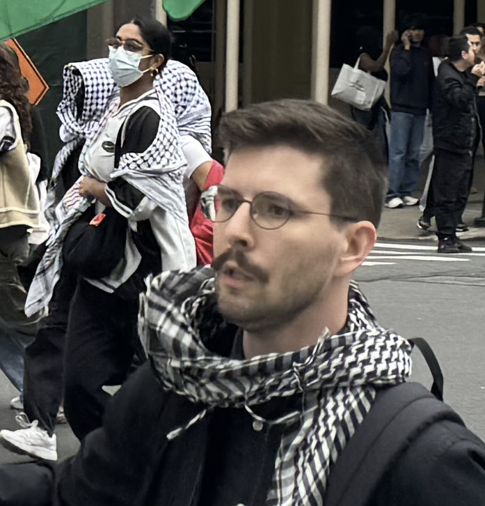 jimmy_rustlin's tweet photo. Working on ID'ing this person. He was spotted protesting at the MET Gala this year. https://t.co/cQ5sYZgFcx