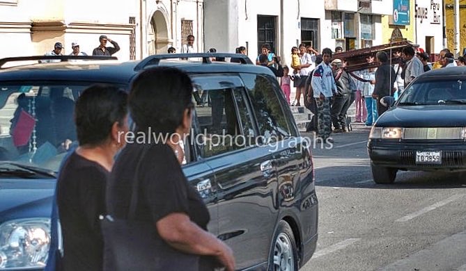 RealWorldImage's tweet photo. A funeral procession in Pisco, Peru, South America. Gary Moore photo. Real World Photographs.  #photojournalism #Peru #Pisco #Grok  #SouthAmerica #travel #Nikon  #garymoorephotography #realworldphotographs #images #stock #cities #dead #history #photography #sweden #malmo https://t.co/yaX3xzSiKC