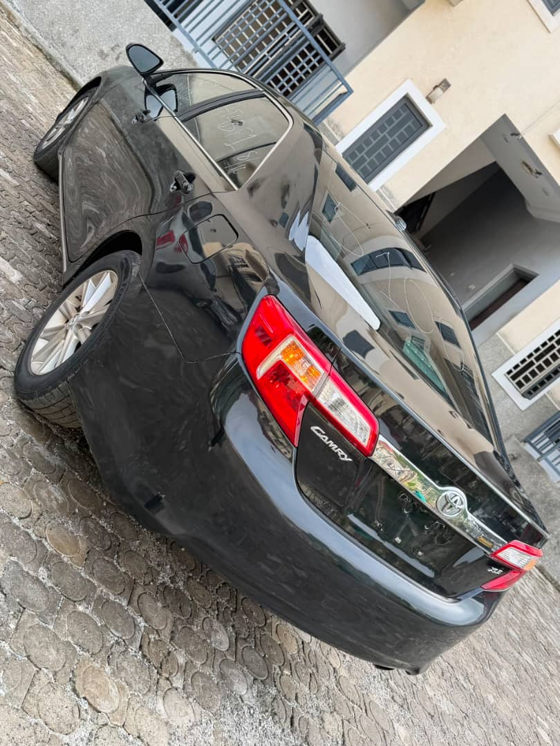 onyefran6's tweet photo. *New arrival:Foreign used 2013 model Toyota Camry XLE Keyless with sunroof and back AC vent, leather interior with may 2026 duty...15m owner kuje abuja deal* https://t.co/FCBnq3Nh64
