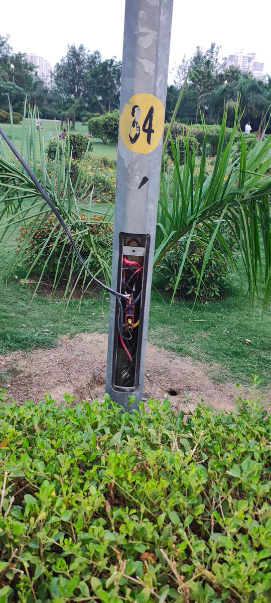 drhemantks's tweet photo. @noida_authority @Noida7x  please cover wires on poles in 76/ 77 park beside prateek wisteria. this can be potential hazard to anyone. https://t.co/YpRTCHQVtG