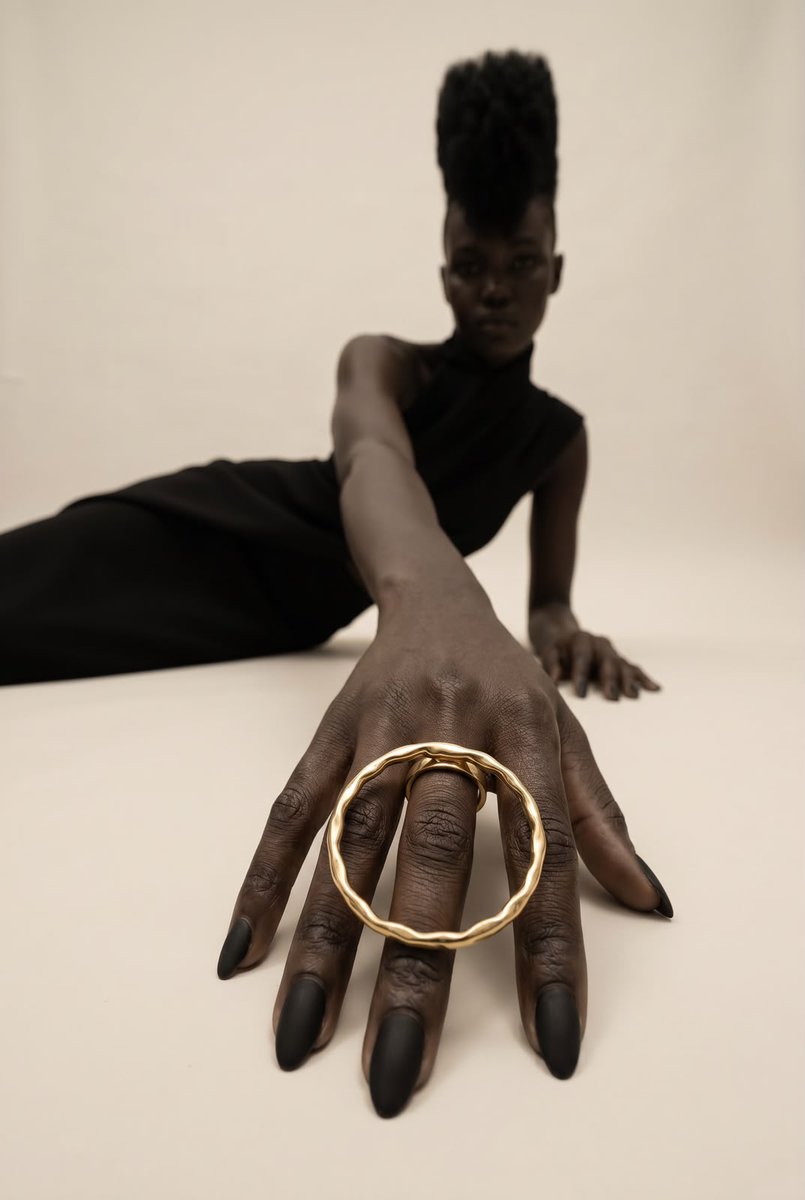 AdeleDejak's tweet photo. Wear the fire. Become the statement.

QABILA carries the spirit of JASIRI IGNITED in every curve. Sculptural, striking, and full of presence, it is wearable art for the woman who moves through the world with unapologetic confidence. 🔥 https://t.co/If8MJFeMxO
