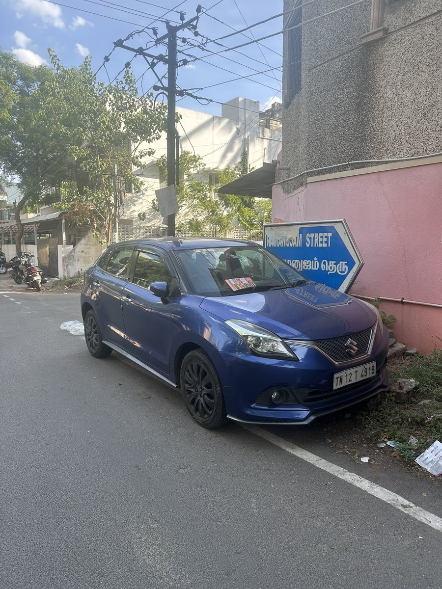 ajithathreya's tweet photo. TN12 T 4919 Suzuki Baleno. This car is regularly parked in the corner of the street &amp; is a big hindrance while turning into the street. @ChennaiTraffic pls make them remove the car.. I have told them so many time but no use. This is Ramanujam Street, Alwarthirunagar. https://t.co/VRJX4tF4nB