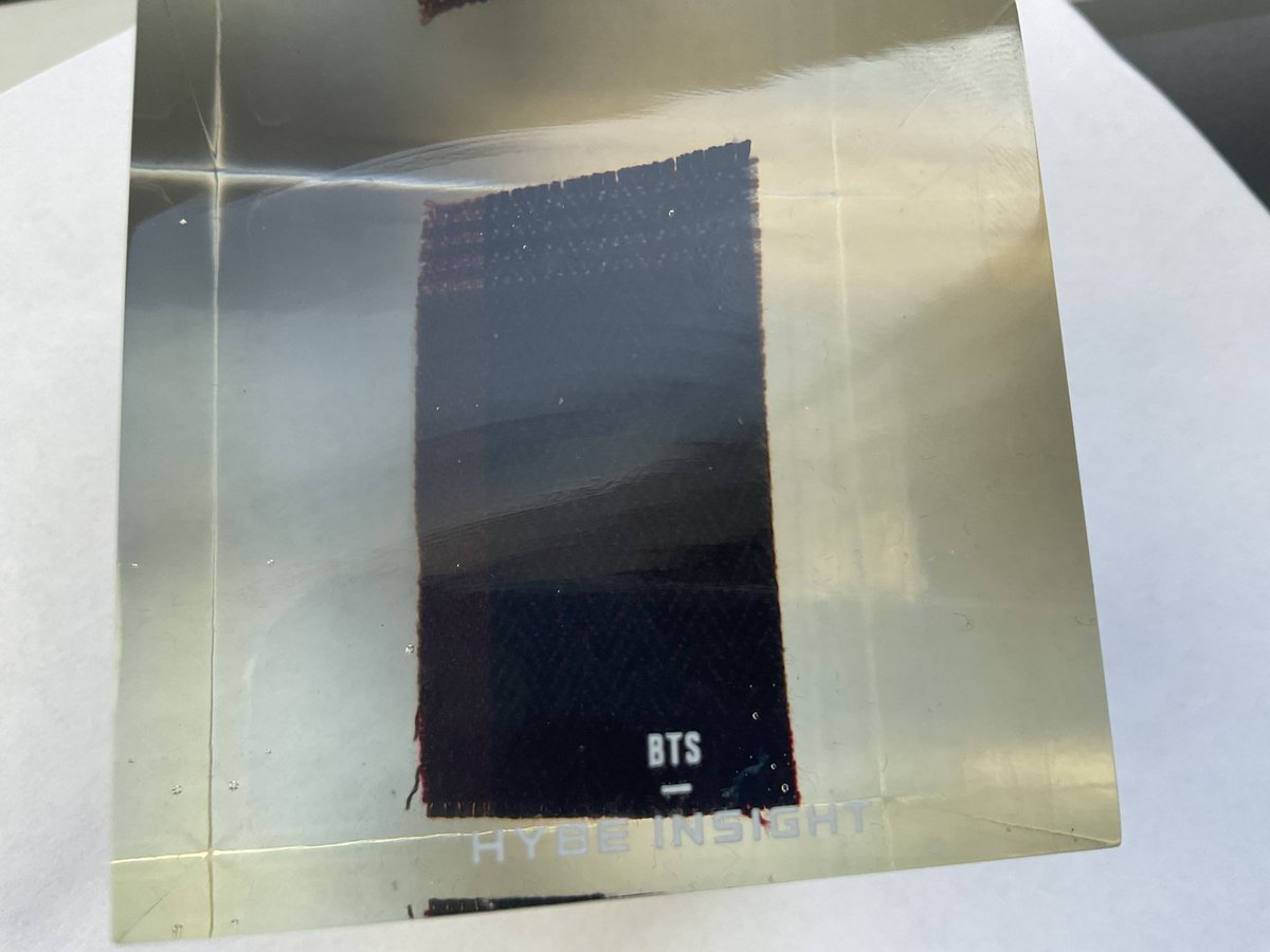Cambear's tweet photo. Since people are posting....anyone know what these Hybe Insight swatches are from? 

I have all the plaids! 🤣 There's green keychain and a very dark (almost black) cube.

I wish they at least labeled the members like the Re:Code bags. https://t.co/choNw8H19E