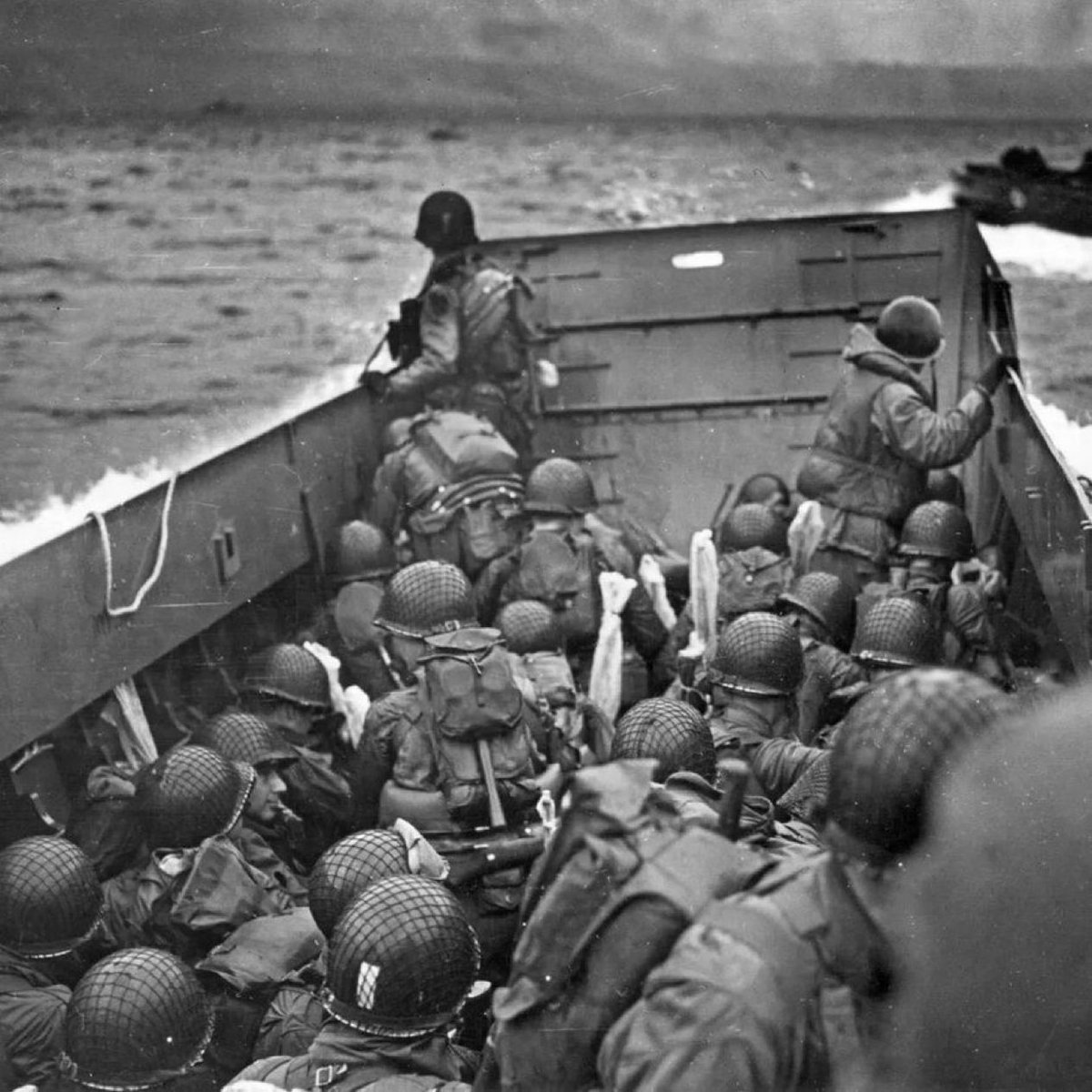 historycalendar's tweet photo. “Into the jaws of death”- With the first wave headed ashore at Normandy, June 6, 1944 https://t.co/P5dzaZ1hWA