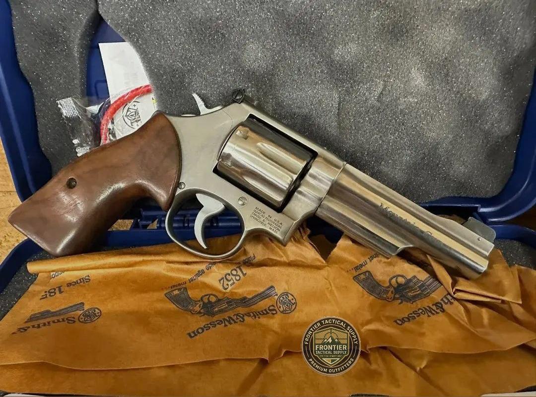 TacticalShit's tweet photo. Smith &amp; Wesson revolvers — Catalog entry.

Two Smith &amp; Wesson revolvers shown in factory cases with grips, paperwork, and cleaning accessories. Documentation date: Saturday, June 6, 2026. https://t.co/1aH0Hb32kz