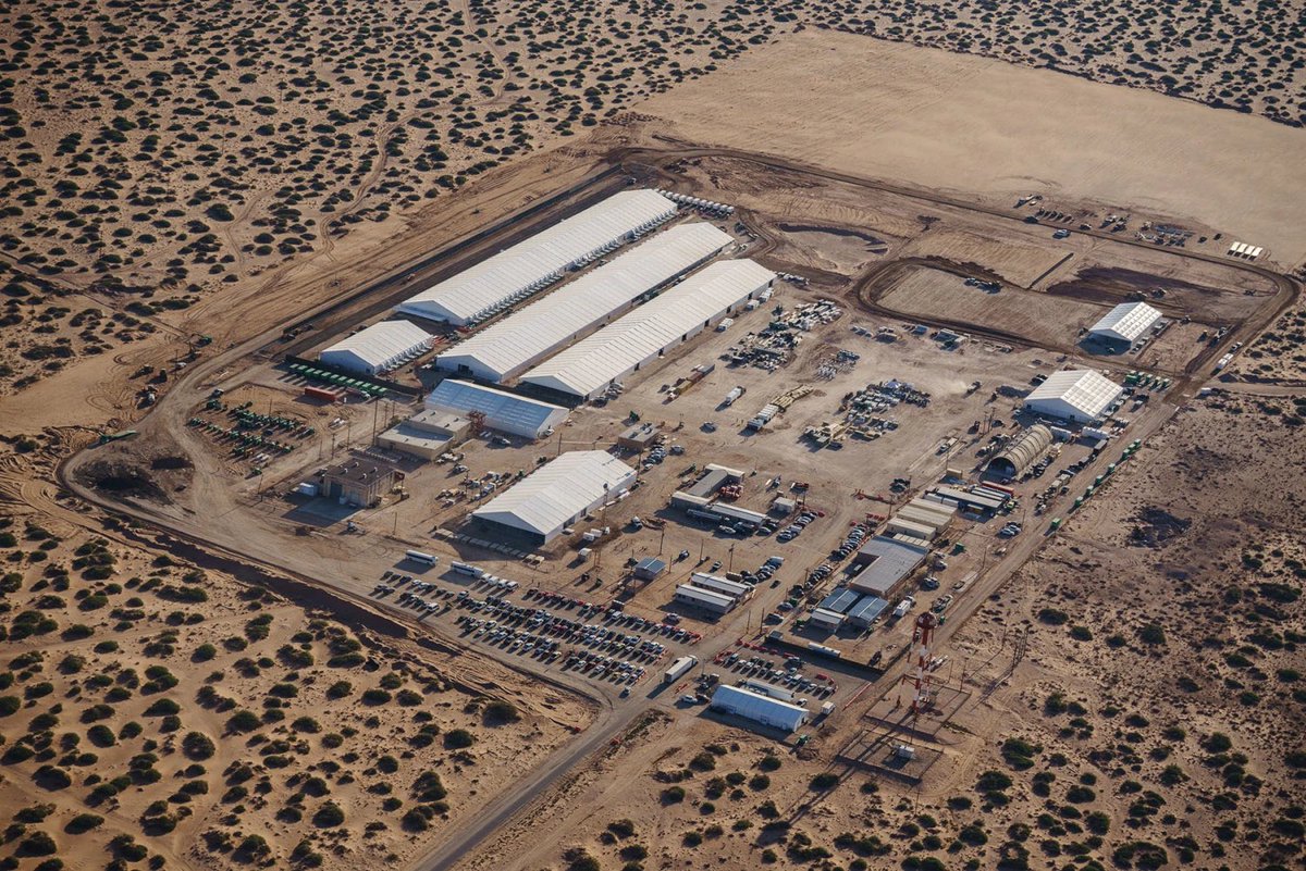 davenewworld_2's tweet photo. A coalition of civil rights groups filed a federal class-action lawsuit over the "horrific" and "inhumane" conditions at Camp East Montana, a desert tent facility on the ⁠Fort Bliss military base in El Paso, Texas. 

The concentration camp opened in August 2025 and it's the nation's largest immigration detention center.

There are allegations of guard beatings, abusive solitary confinement, inadequate medical and mental-health care, disease exposure, and coercion to sign deportation papers. 

A recent inspection found 49 violations of detention standards, and at least 3 people have died in the facility's first 9 months.

This is a real-life horror movie: Military base with a concentration camp in the desert. Thousands of detained people isolated from public view. Human rights violations shrouded in secrecy.