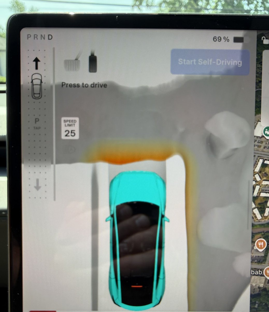 MarkGrabowski's tweet photo. So one parking issue I’ve had since 14.2 and still 14.3 is isolated to two spaces I frequent. When pulled in a space and leaving, when I press the brake it goes into Drive to go forward. This is clearly blocked by a curb. If pressing start self driving it will go forward. I report this as critical. Not sure if there is a better way.