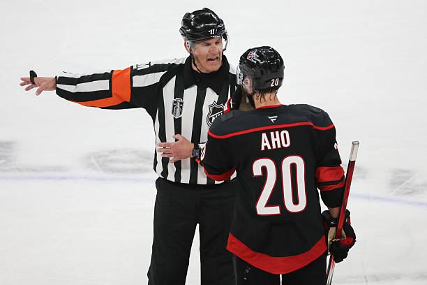 ScoutingTheRefs's tweet photo. Refs for Hurricanes vs. Golden Knights are Wes McCauley (#4) and Chris Rooney (#5). Tonight's NHL Stanley Cup Game 3 officials: https://t.co/znqlhlRKG1 
#CARvsVGK #SoundTheSiren #ForgedInGold @Canes  @GoldenKnights https://t.co/TEYf0KfOw2