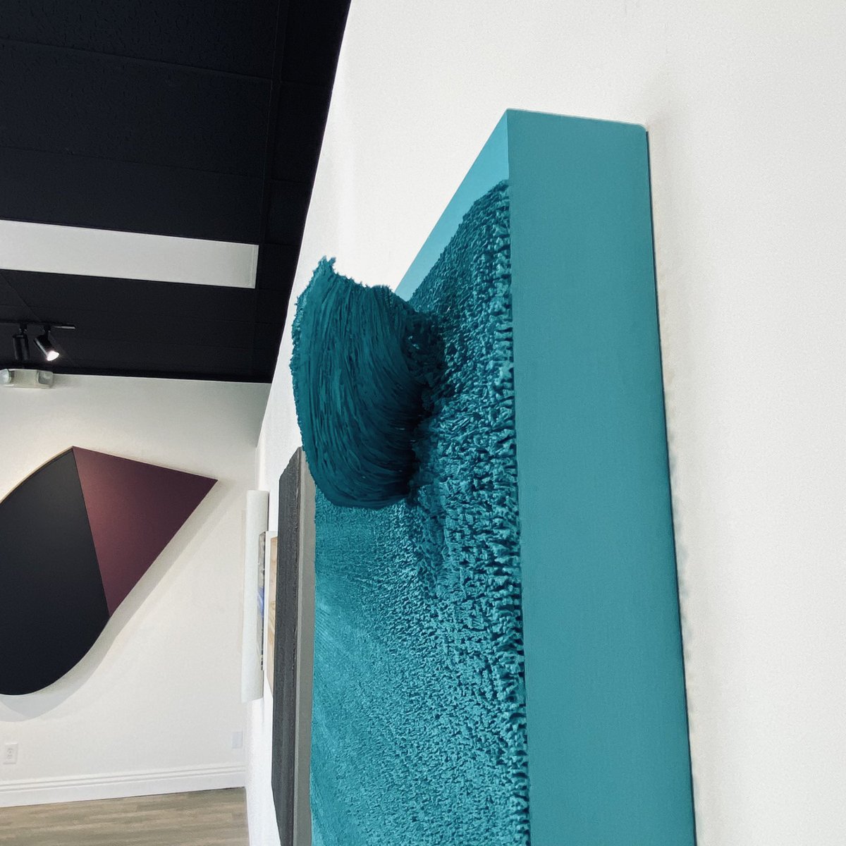 CaesarAlzateJr's tweet photo. Now at SCAPE ANNEX at Corona Del Mar, the manifestation of the paint into a form … wave, fin, wing, or geological rock thing … is the element of authenticity, my actions caused that. https://t.co/HsAcwBd6a6
