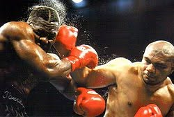 20thCentBoxIMM's tweet photo. Ike Ibeabuchi (left) and David Tua (right) put on perhaps the best heavyweight fight of the decade, on June 7, 1997, at the Arco Arena in Sacramento, California.
Ibeabuchi picked up a unanimous decision win in a non-stop action-packed slugfest from start to finish.
Ibeabuchi was 16-0 with 12 knockouts, and Tua was 27-0 with 23 knockouts with Tua the betting favorite.
Ibeabuchi landed 332 of 975 punches, and Tua landed 282 of 755 punches. 
They combined to throw 1,730 punches, which set the CompuBox record for punches thrown in a heavyweight fight. 
Ibeabuchi also set the individual record for punches thrown by a heavyweight. 
It is pretty amazing that neither guy got knocked down, or even in any serious trouble, during this unforgettable fight.
After the fight, Ibeabuchi complained of a terrible headache and was taken to a hospital. He underwent several tests, including an MRI, but nothing abnormal was found. After being released from the hospital, Ibeabuchi began to say that he was being plagued by demons and evil spirits. He would TKO Chris Byrd in five rounds, in his next fight, and then be plagued with legal and mental health issues for years.