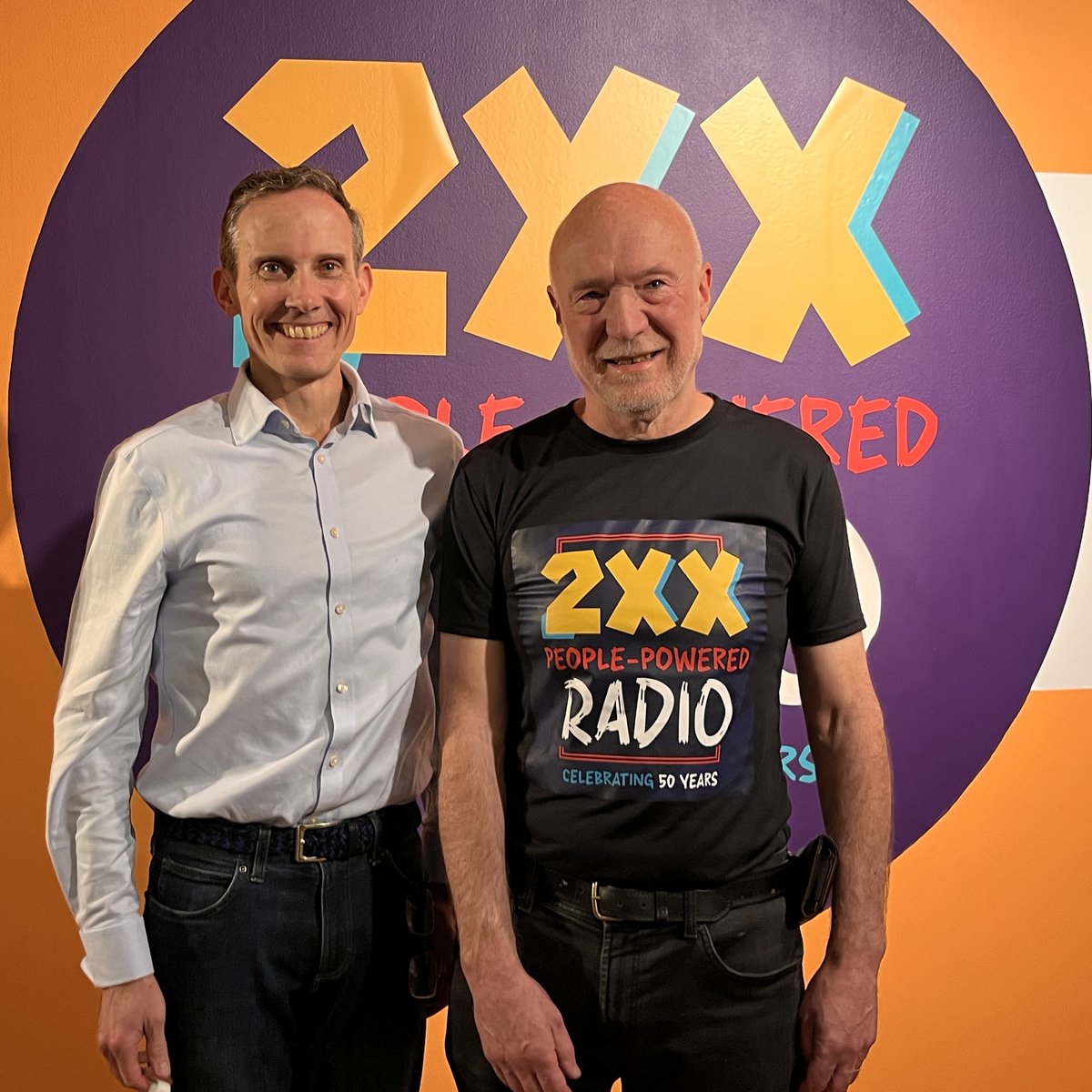ALeighMP's tweet photo. Fifty years of people-powered radio. Great to join longtime broadcaster Declan O’Connell to celebrate 2XX’s 50th birthday, from its Radio ANU roots to five decades shaping Canberra’s airwaves. The 2XX exhibition is at Canberra Museum + Gallery until 6 September. #canberra #auspol https://t.co/LwzXpWdFbP