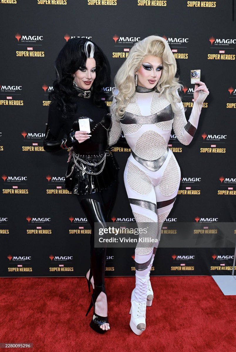 Drag_Crave's tweet photo. Bosco &amp; Irene the Alien look otherworldly for the Magic: The Gathering x Marvel Superheroes crossover launch event in Los Angeles, California. https://t.co/KiJMLKKONH