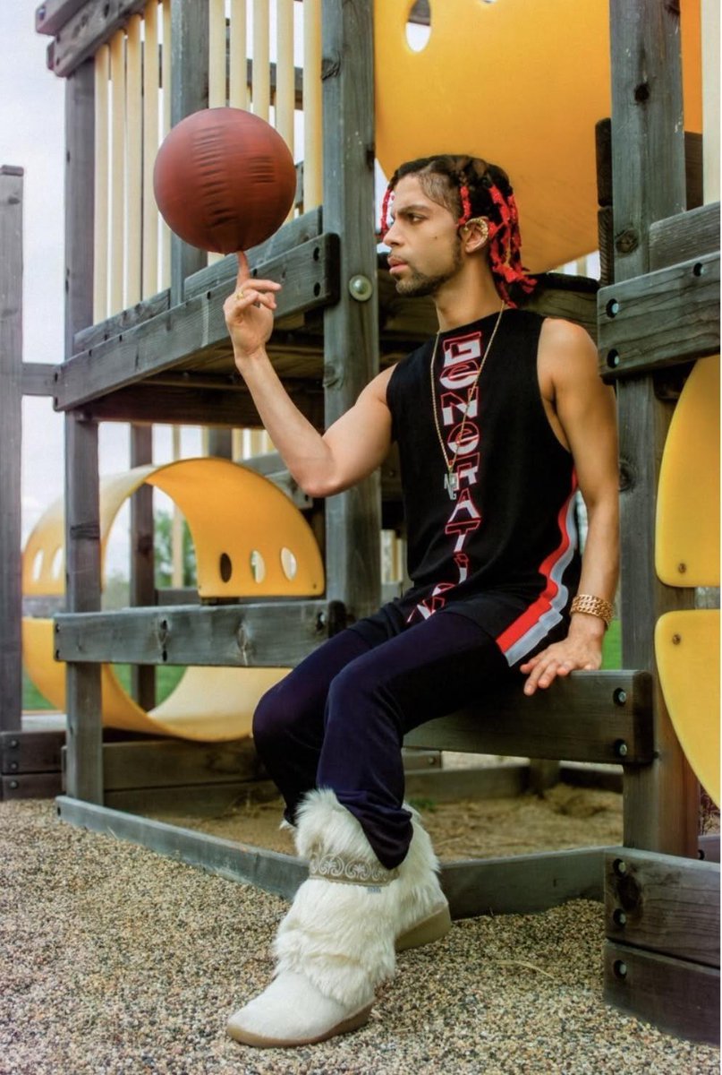 BlackMediaHub's tweet photo. Prince at the Paisley Park playground spinning a basketball on his finger (1999) https://t.co/vmDMhcVtuL