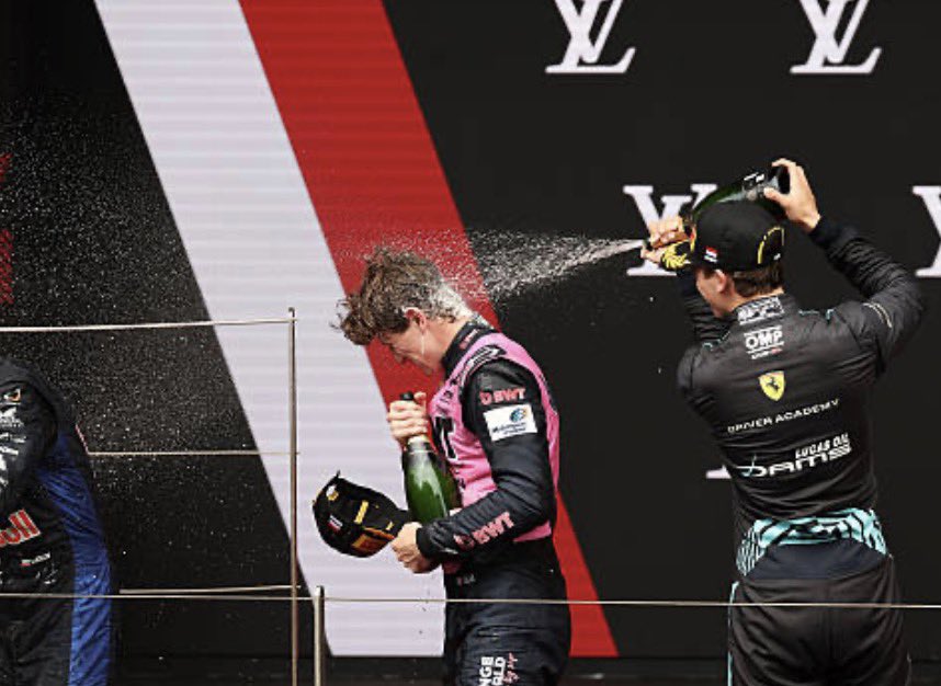 NORRIS5O5's tweet photo. a series of events aka Alex being attacked on the podium https://t.co/XQmxFBIcC5