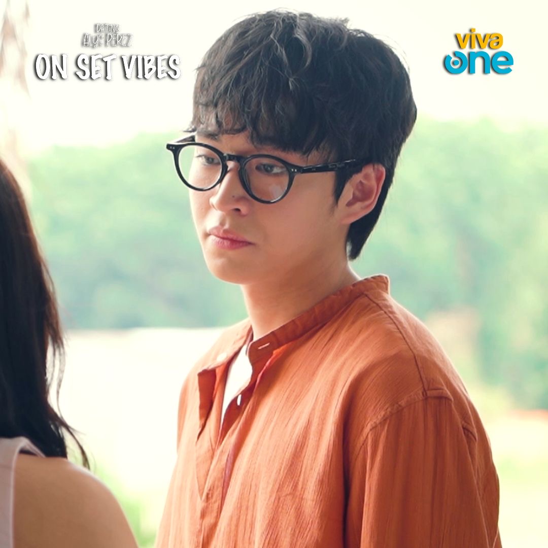 VivaOnePH's tweet photo. GUYS… HE’S BACK 😭

Drake Palma is really back—look at this!! 
Photos pa lang, ramdam mo na agad ang emotions 

Step inside the world of Dating Alys Perez with an exclusive BTS first look through DAP: On Set Vibes—prepare for heartbreak and healing. https://t.co/zf99mDT8OP https://t.co/zTZa3ojGRN