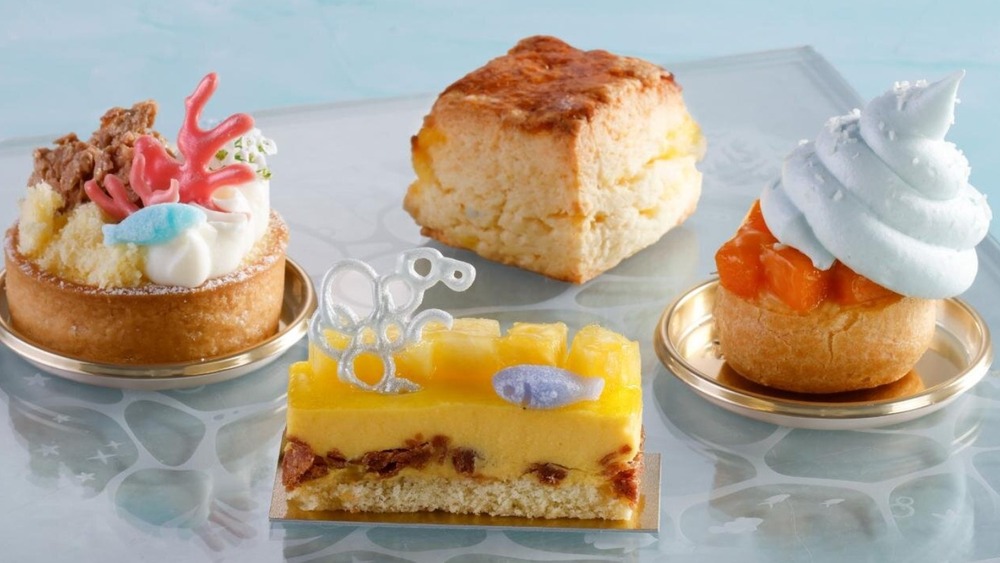 fashionpressnet's tweet photo. 「人魚姫」アフタヌーンティーがシェラトン都ホテル大阪で、お城ケーキ＆貝殻マカロンで幻想的な海の世界を表現 - https://t.co/v5CDvmfhRZ https://t.co/h1QF1c0MOO