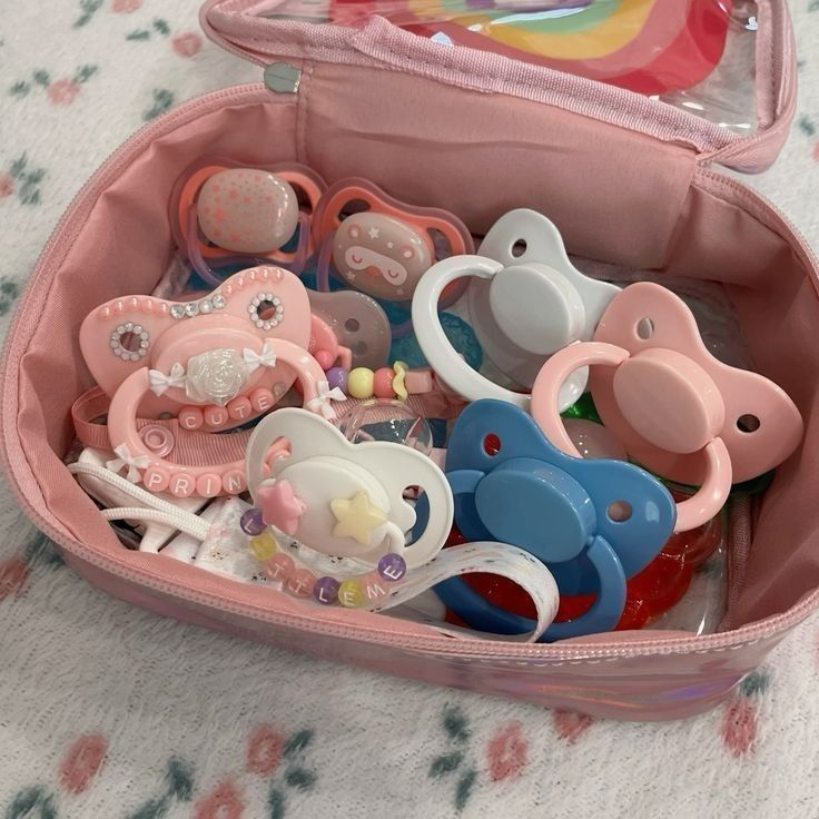 BabyElla420's tweet photo. Baby who regresses to a infant age and relies on pacis &amp; teething rings to self sooth x whimsical gift giving cg who loves to collect colorful pacis and bite toys every time they're out, getting butterflies every time tiny beams at them &amp; unboxes a new lovey 

  #agere #adultpaci https://t.co/dhNMvnPL9H