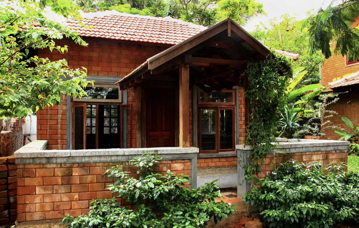 shavnyuy's tweet photo. Brick does not go out of style. It does not follow trends. It does not need a coat of paint every five years to stay relevant. It just gets better with age, the way only honest materials do.

La Casa Roja, Chennai. Exposed brick walls, double layered Mangalore clay tile roof, a concrete tank at the rear that becomes a lily pond, a wide back verandah that pulls you away from the city into something quieter. The architect kept the old mango orchard on site. The house was planned around the trees, not the other way around.

The interiors carry antique furniture the clients collected over two decades. Every room reflects the person living in it. Nothing was bought to impress. Everything was chosen to belong.

This building was completed in 2010. It looks like it has always been there. That is what brick does.

Benny Kuriakose and Associates | Chennai, Tamil Nadu 🇮🇳 | 2010