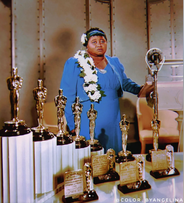 BlackMediaHub's tweet photo. Hattie McDaniel accepted her Oscar at a segregated "No Blacks" hotel in Los Angeles for her role in "Gone with the Wind." She made history as the first Black American to win an Oscar. Sadly, all of the film's Black actors, including McDaniel, were prohibited from attending the film's premiere in 1939 at the Loew's Grand Theatre in Atlanta, Georgia. Clark Gable, one of the film's stars, refused to attend if Hattie wasn't allowed, but she convinced him to go without her. Even though McDaniel was eventually allowed into the hotel, she had to be escorted and was relegated to the back of the room, separated from her white co-stars.