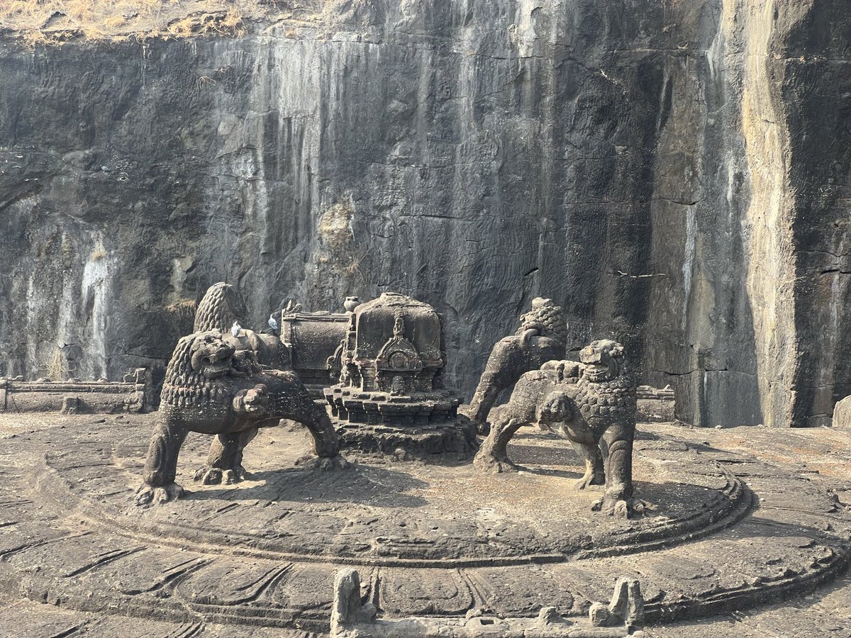 LivingExtraord1's tweet photo. Kailasa temple from the top. They would have had to start from the top down and either carved these first or left space bc they knew they were going to. https://t.co/cv67UbghMB