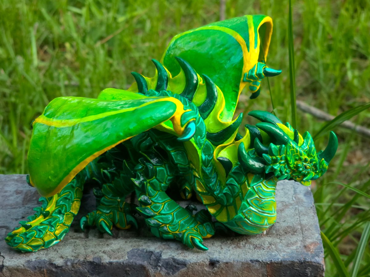 grimxing's tweet photo. An emerald dragon 🐲 forged in polymer clay https://t.co/UkbUQfIaXJ