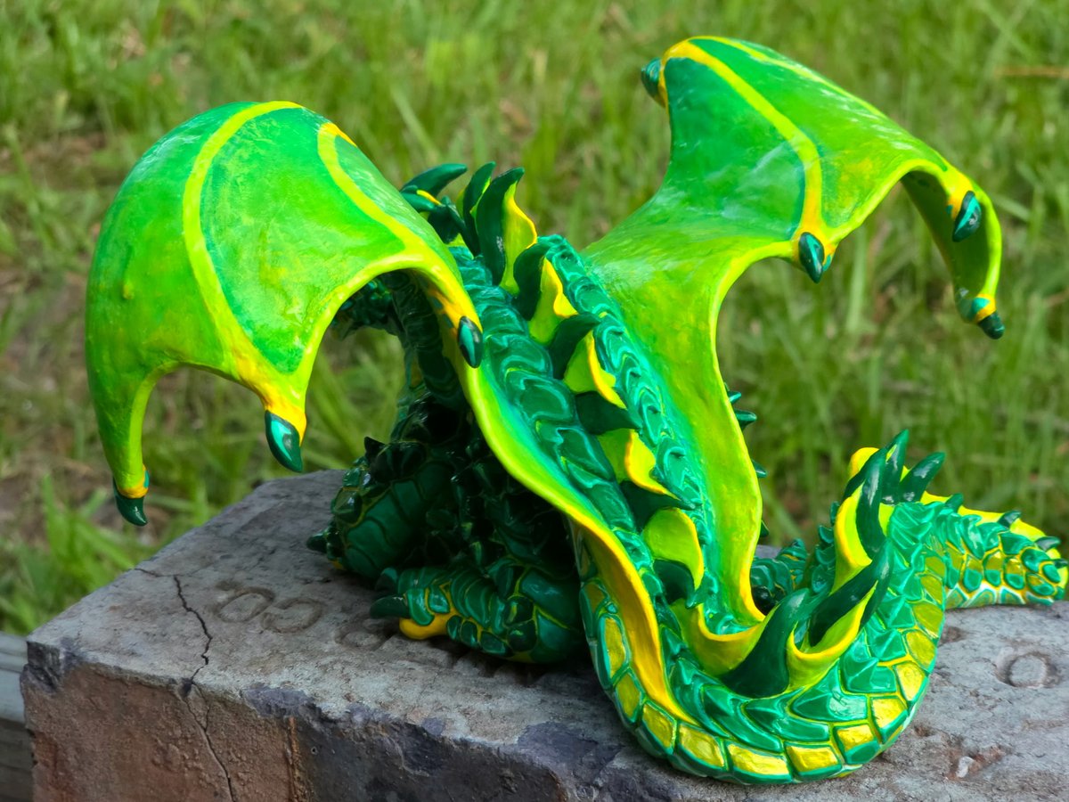 grimxing's tweet photo. An emerald dragon 🐲 forged in polymer clay https://t.co/UkbUQfIaXJ